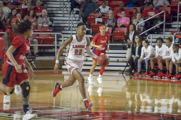 Miya Crump, LU freshman forward, dribbles the ball down the court against South Alabama defenders in the first round of the WNIT, Friday, in the Montagne Center. UP photo by Cade Smith
