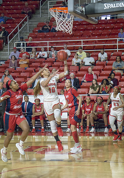 Chastadie Barrs, LU senior guard, goes for a layup against South Alabama defenders, in the first round of the WNIT, Friday in the Montagne Center. UP photo by Cade Smith