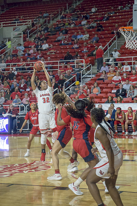 Umaja Collins, LU freshman center, rebounds the ball against South Alabama defenders, in the first round of the WNIT, Friday in the Montagne Center. UP photo by Cade Smith