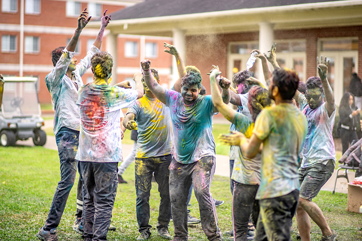 Lamar students celebrate Holi or “the Festival of Colors” early in front of Brooks-Shivers Dining Hall, Feb. 28. UP photo by Noah Dawlearn