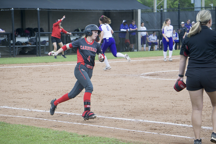 Savana Guidry, senior shortstop, runs to first base to get and RBI during Lamar’s 1-0 victory against the University of Central Arkansas, Mar. 30, at the LU softball complex. UP photo by Cade Smith