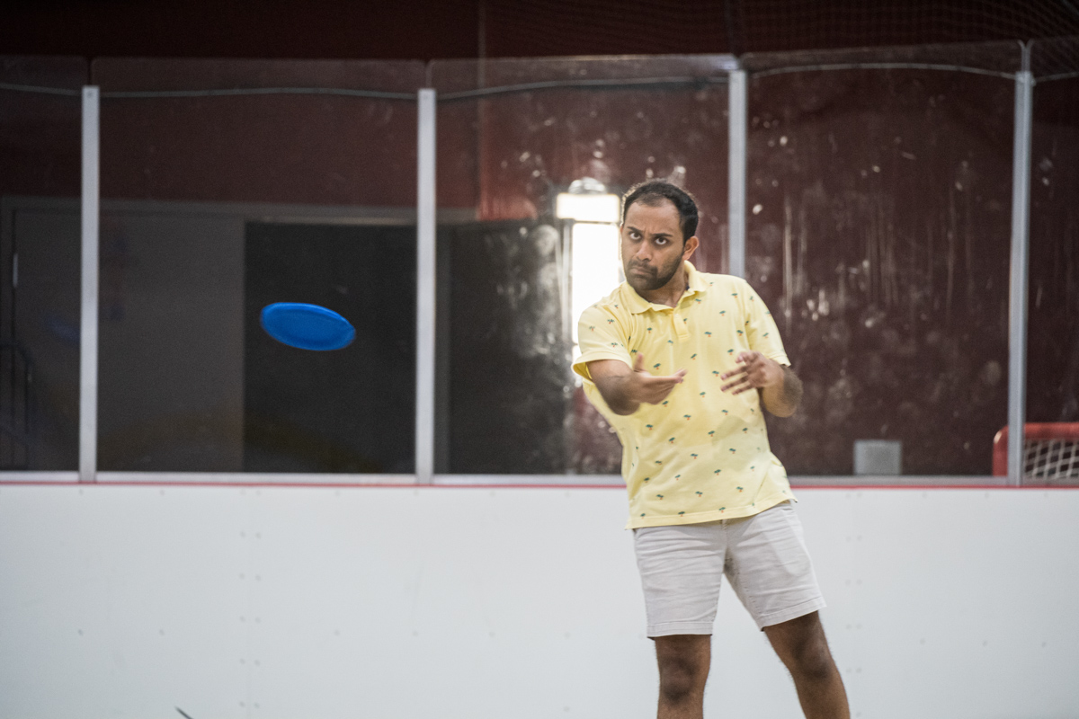 Lamar Student throws the frisbee across the indoor soccer arena in the Sheila Umphrey Recreational Sports Center on Aug 28.