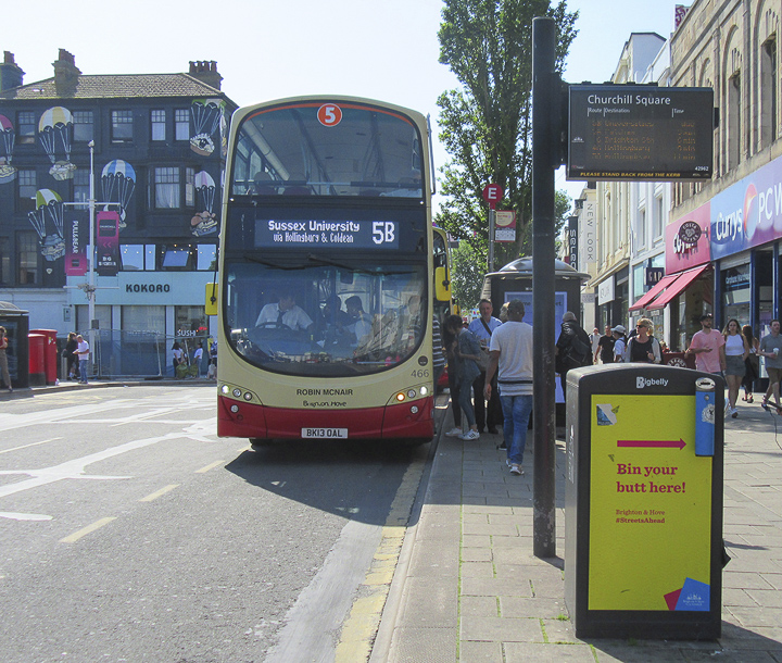 Each bus shows its designated stop and the route it will take to get there. At each bus stop, there is an electronic sign, right, showing future departures from that stop which also lets customers know if a bus is running behind schedule.