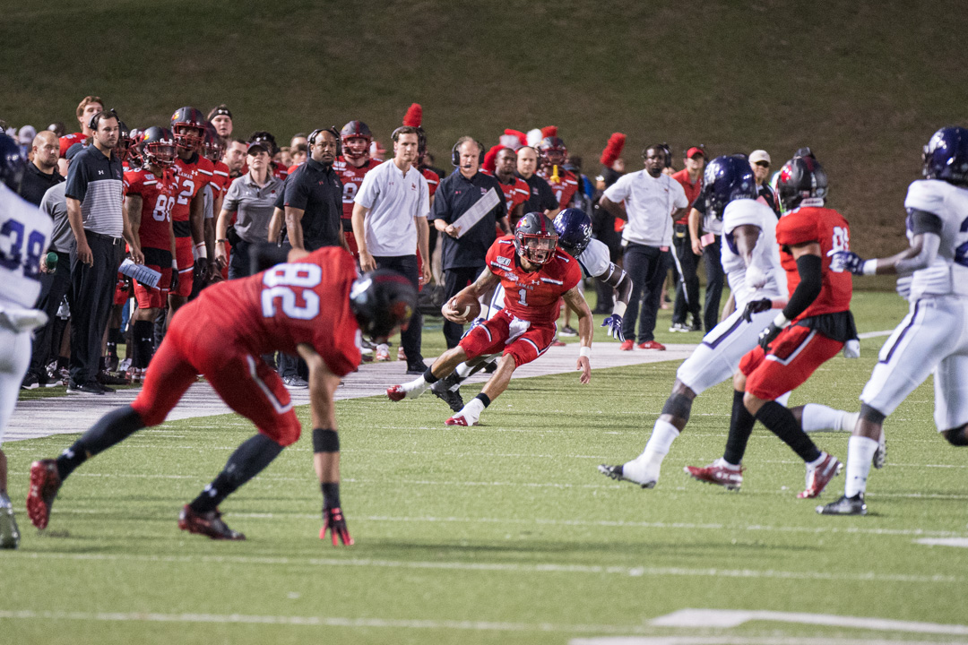 LU Quarterback, Jordan Hoy scrambles during the 17-24 loss against the Stephen F. Austin Lumberjack at Provest Umphery Stadium, Sep. 28. UP photo by Noah Dawlearn