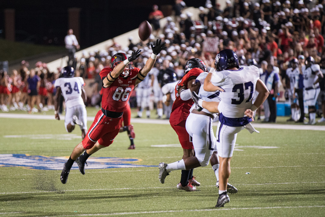 LU Wide Receiver, Garrison Spring reaching to block a punt during the 17-24 loss against the Stephen F. Austin Lumberjack at Provest Umphery Stadium, Sep. 28. UP photo by Noah Dawlearn