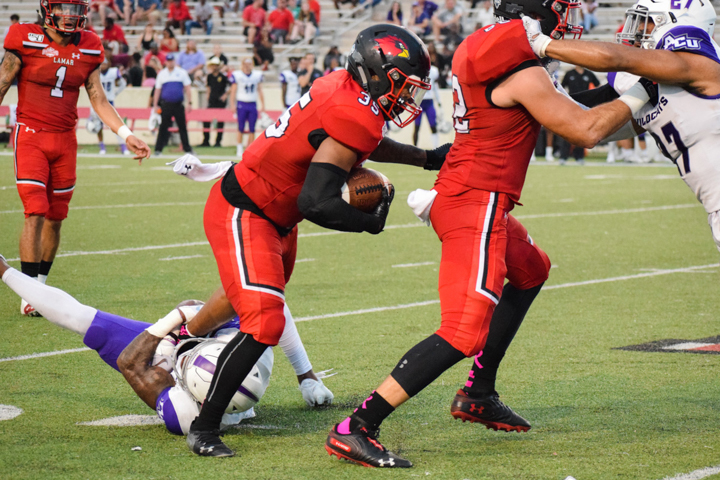 LU’s Tamauge Sloan is tackled during Saturday’s 27-24 win over Abilene Christian University in Provost Umphrey Stadium. UP photo by Isabel Martinez