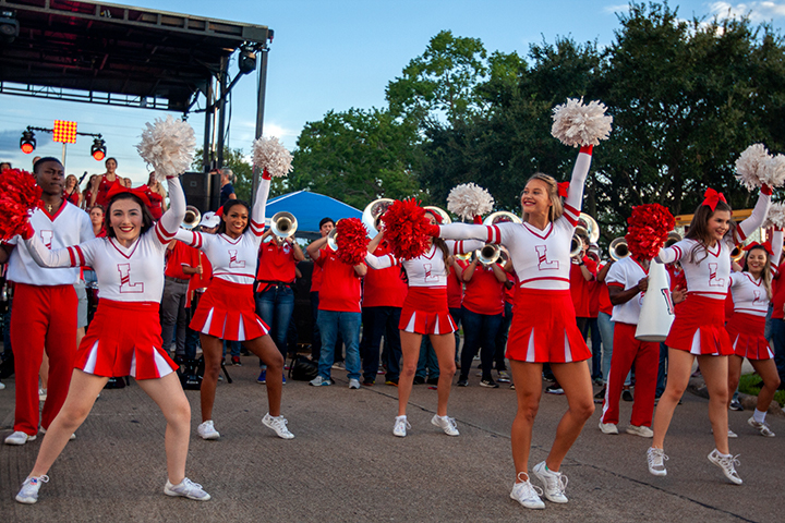 LU's spirit squad cheer during the Homecoming Pep Rally and Bonfire, Sept. 27. UP photo by Delicia Rocha