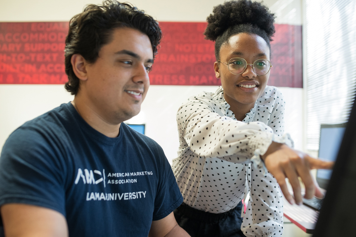 Justin Norris and Reality Boutte utilize the computer lab — the first of its kind in the Texas State University System, Nov. 5. UP photo by Noah Dawlearn