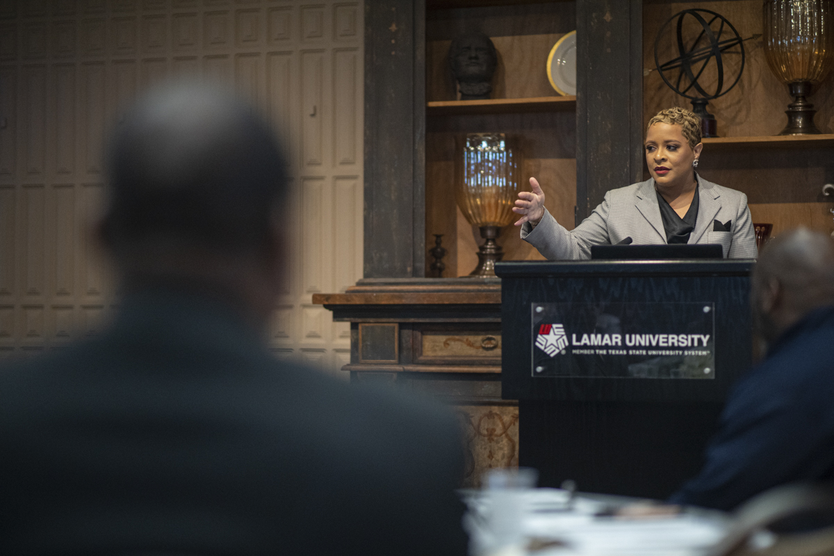  Doctor Bello-Ogunu, left , listens to, the keynote speaker of the MLK day Event that was hosted in the 8th floor of the John and Mary Gray Library on Thursday. UP Photo by Noah Dawlearn