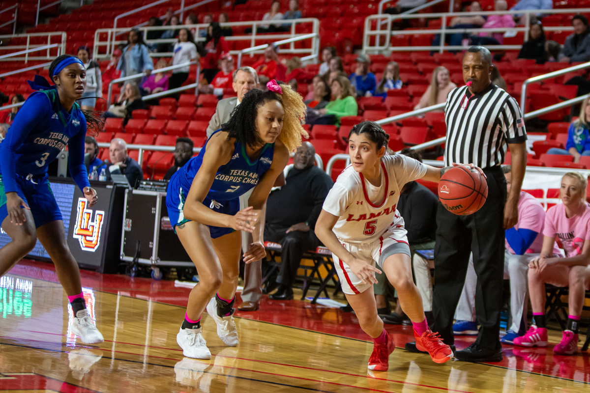 Lady Cardinal Amber Vidal, 5, drives against the Texas A&M Corpus-Christi Lady Islanders, Saturday, in the Montagne Center. UP photo by Jared Brown