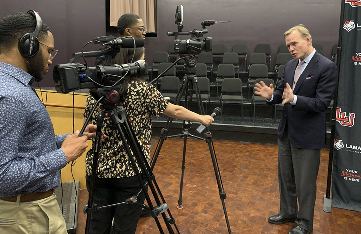 John Dickerson gives an interview to Channel 6 and LUTV News, Monday, in the Rothwell Recital Hall. UP photo by Olivia Malick