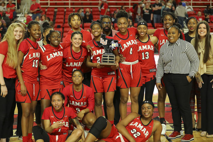 The Lady Cardinals celebrate after beating the McNeese State  Cowgirls 80-70  in the Southland Conference season finale. Courtesy photo