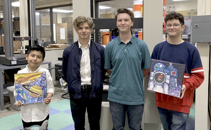 Lumberton ISD students Giovanni Galvan, left, Lucas Mason, Austin Havard, and McRill Garrett visit the Cherry Engineering Building at Lamar University, March 2. The students won the Student Space Flight Experiment Program and will have their experiments sent out to space. UP photo by Tiana Johnson