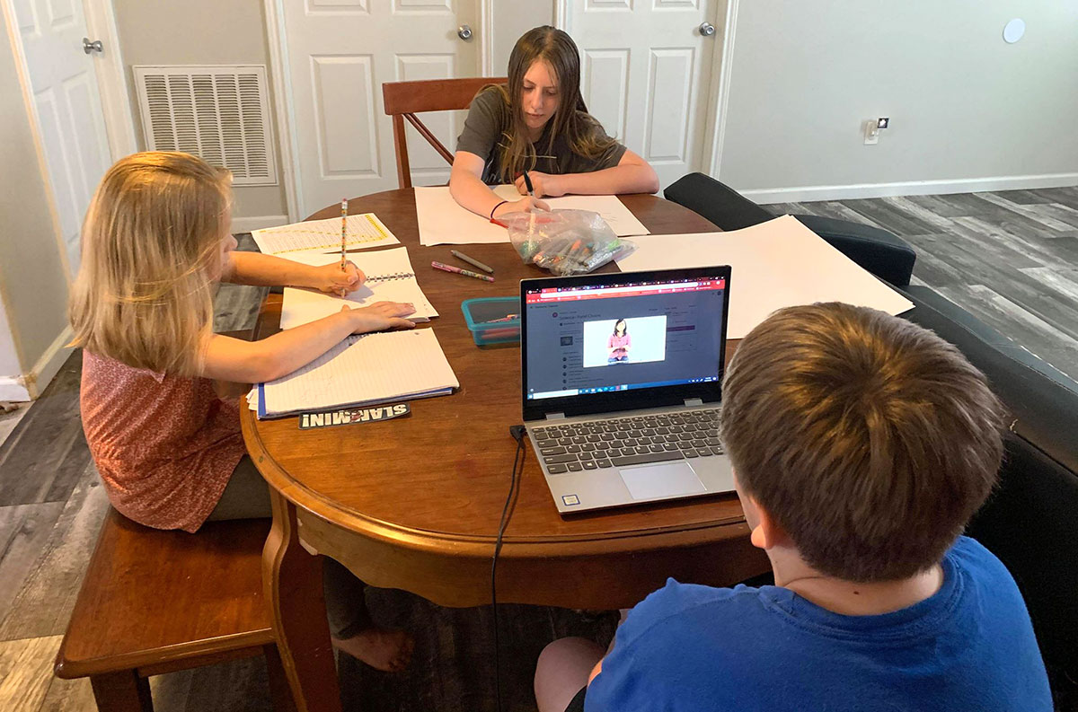 LU student Haley Snyder's children work on school work at home. Courtesy photo