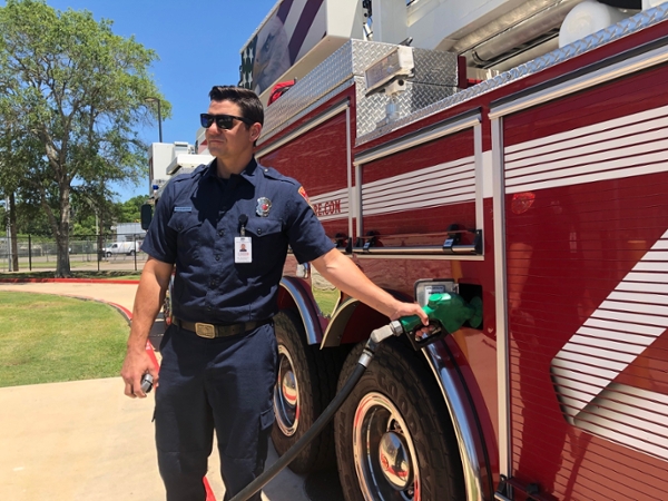 A City of Beaumont Firefighter fuels a fire truck on Thursday, April 30, 2020 in Beaumont. ExxonMobil donated 25,000 gallons of fuel to Jefferson County and the City of Beaumont for use in first response vehicles.