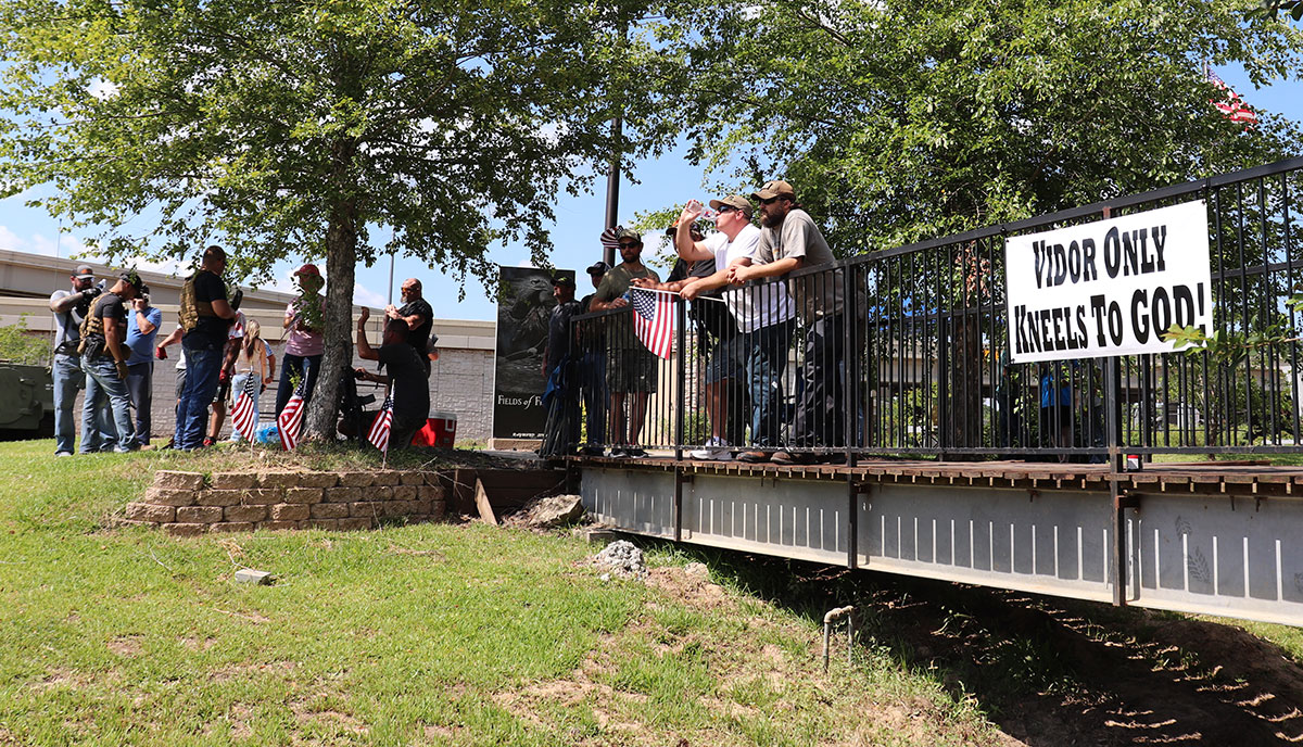 A small group of counter protesters watch the rally in memory of George Floyd in Vidor, June 7