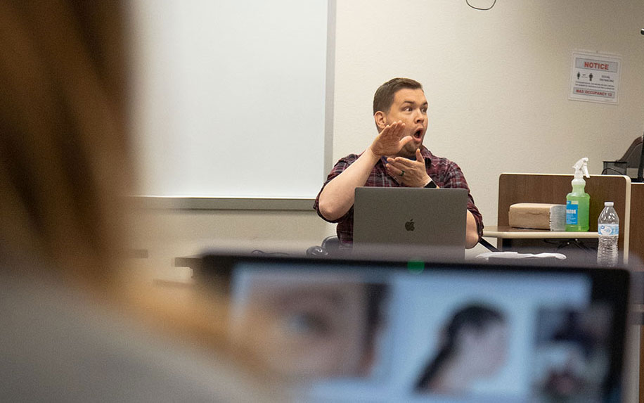 Deaf innstructor Lyman Mann teaches ASL in his classroom at Lamar University.