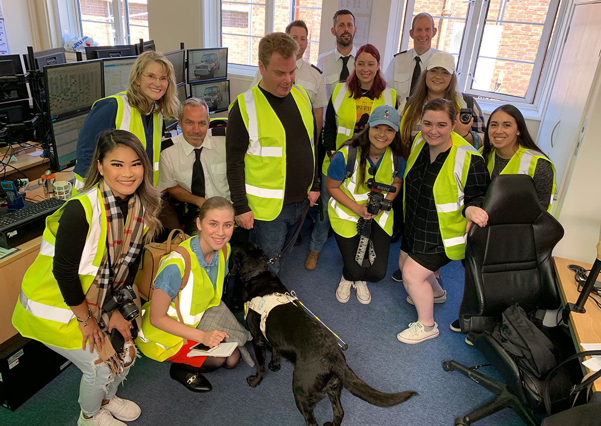 Members of the 2019 study abroad program to Brighton, England, worked to cover the city's innovative bus accessibility program.