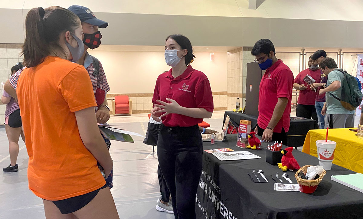 Students get information on student organizations during the Involvement Fair in the Sheila Umphrey Recreational Sports Center, Aug. 25. UP photo by Reina Morgan