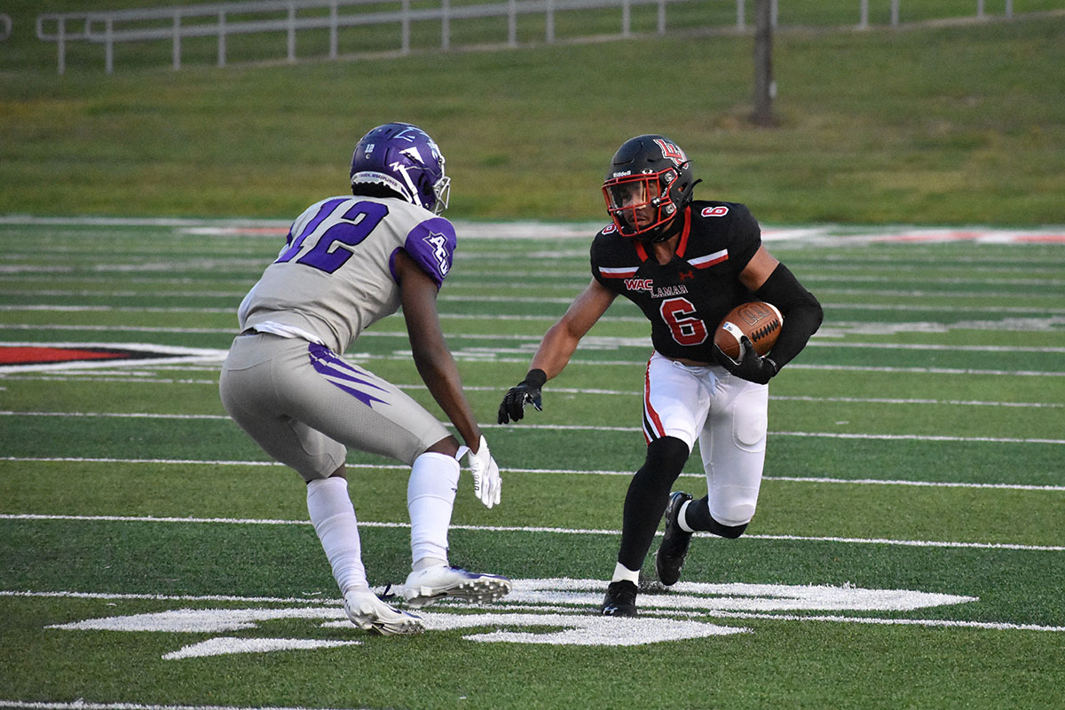 LU receiver Erik Pizarro tries to find a way through the Abilene Christian University defense, Sept. 25, at Provost Umphrey Stadium. UP photo by Keagan Smith