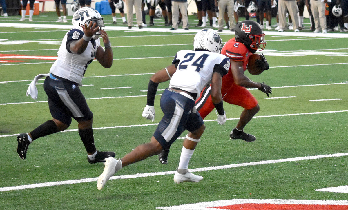 James Jones rushes past a Stallions' defender during LU's 47-3 win over NAU at Provost Umphrey Stadium, Sept. 2. UP photo by Keagan Smith