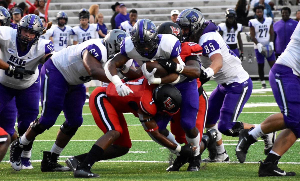 LU's Tyler Jackson, 7, and Jaymond Jackson make a tackle against the Central Arkansas defense during the Oct. 23, 49-38 loss at Provost Umphrey Stadium. UP photo by Keagan Smith