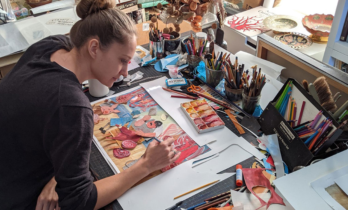 Vera Gachot works on book pages for "Grandma’s Tea,” her senior art thesis. Courtesy photo