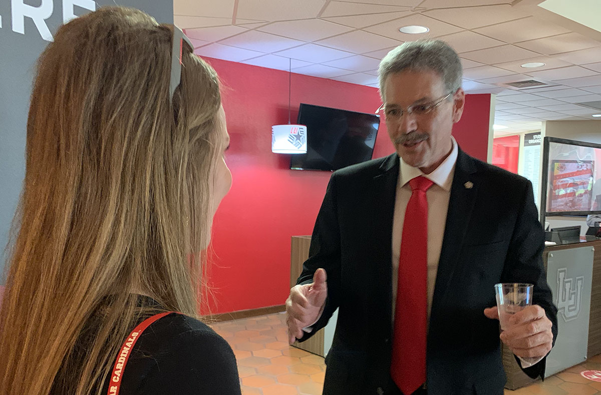 Taylor speaks with Tilisa Thibodeaux, dean of the Reaud Honors College and TALH program, June 17, at a meet and greet with faculty and staff in the Herman Iles Building of the John Gray Center. UP photo by Olivia Malick