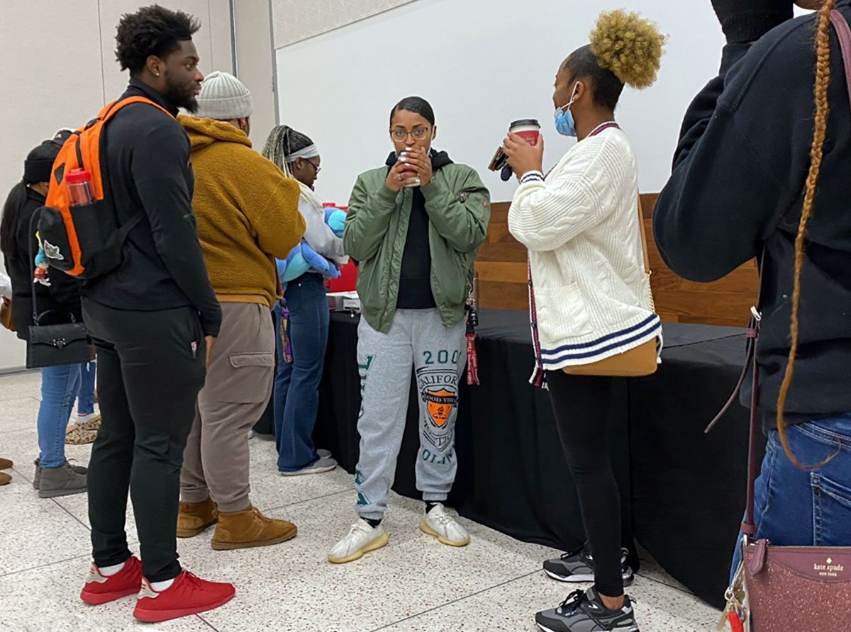 Students gather before the movie starts at Movie Night Under the Stars event in Setzer Student Center, Jan. 20. UP photo by Maddie Sims