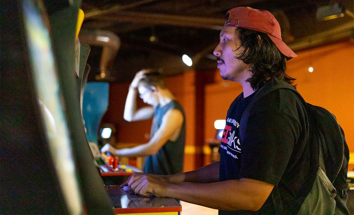 Students play video games at the Retro Arcade event in the Sheila Umphrey Recreational Sports Center, Sept. 29. UP photo by Brian Quijada.