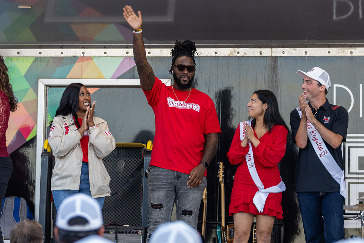 Malena Warne, left, and Jaquor Pugh, center, are named Homecoming King and Queen as Stefany Rico and Jacob Murphy look up during the Homecoming bonfire and pep rally at the Spindletop-Gladys City Field, Sept. 30. UP photo by Brian Quijada.