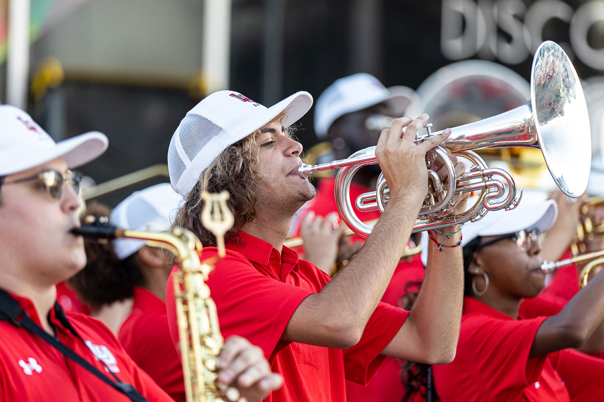 Members of LU’s Showcase of Southeast Texas marching band perform during the Homecoming bonfire and pep rally at the Spindletop-Gladys City Boomtown Museum, Sept. 30. UP photo by Brian Quijada.