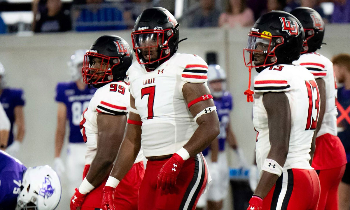 Junior linebacker Tyler Jackson gathers with the rest of LU's defense.