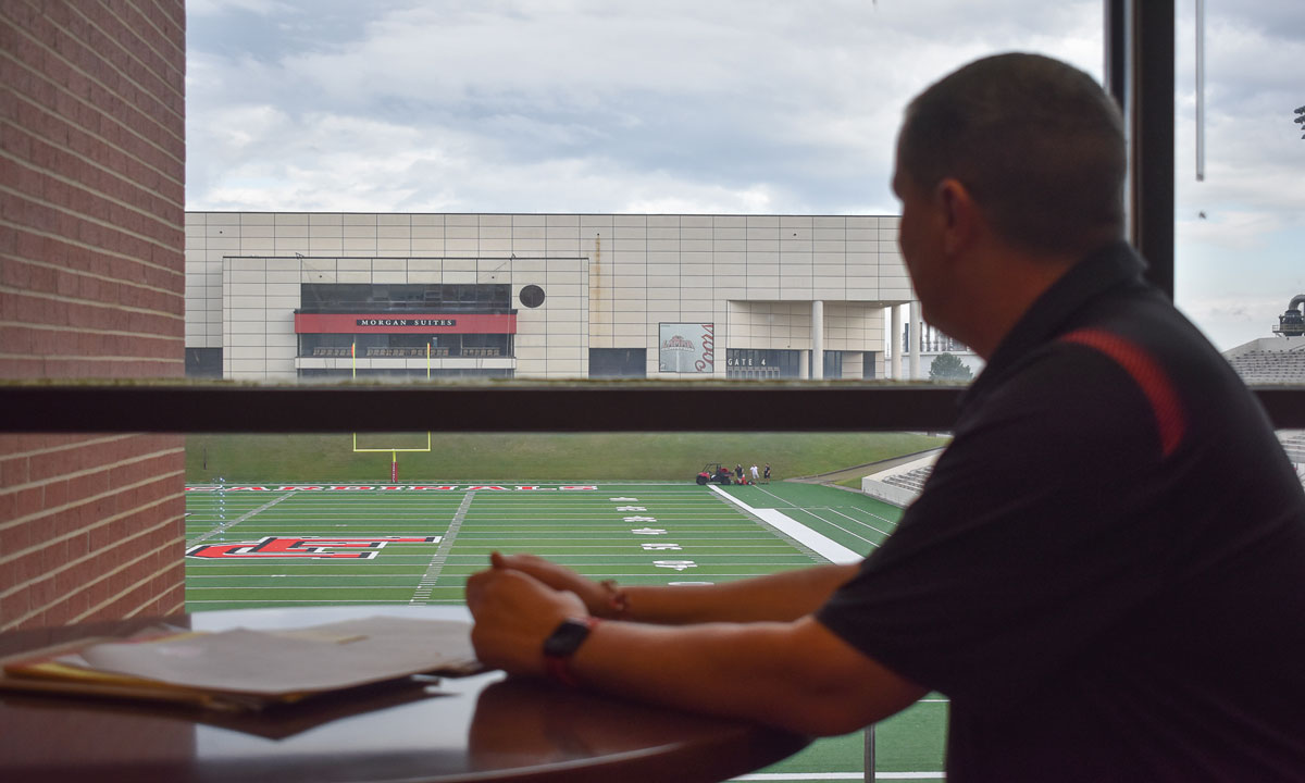 Jeff O'Malley sits in his office overlooking the field at Provost-Umphrey Stadium. Image credit: Keagan Smith, UP sports editor.