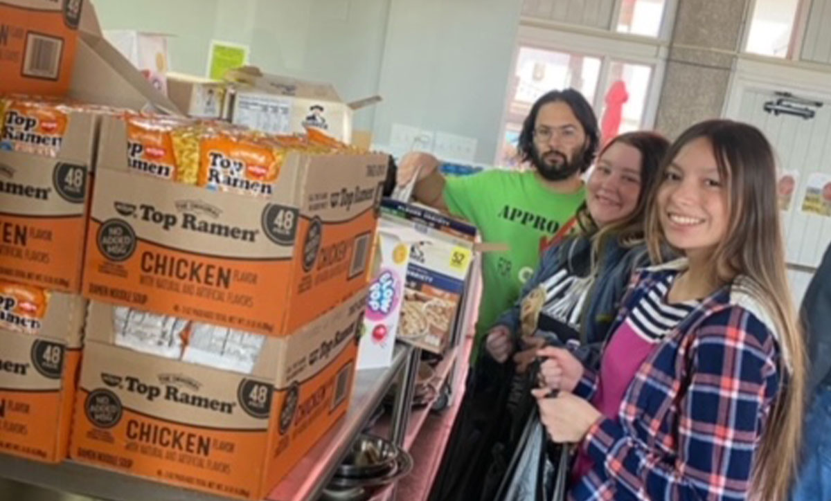 Students help bag snack packs so that each week on Friday, 200 or so snack packs could be handed out to students on campus. Wesley partnered with St. Mark’s Episocopal Church for the event.