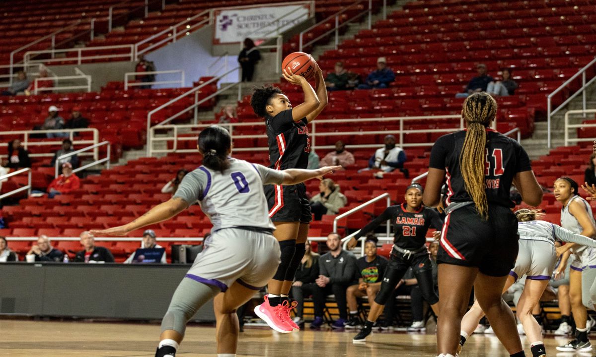 Sabria Dean takes a jump shot over a Tarleton State defender in the Montagne Center, Feb. 26. Photo credit: Brian Quijada