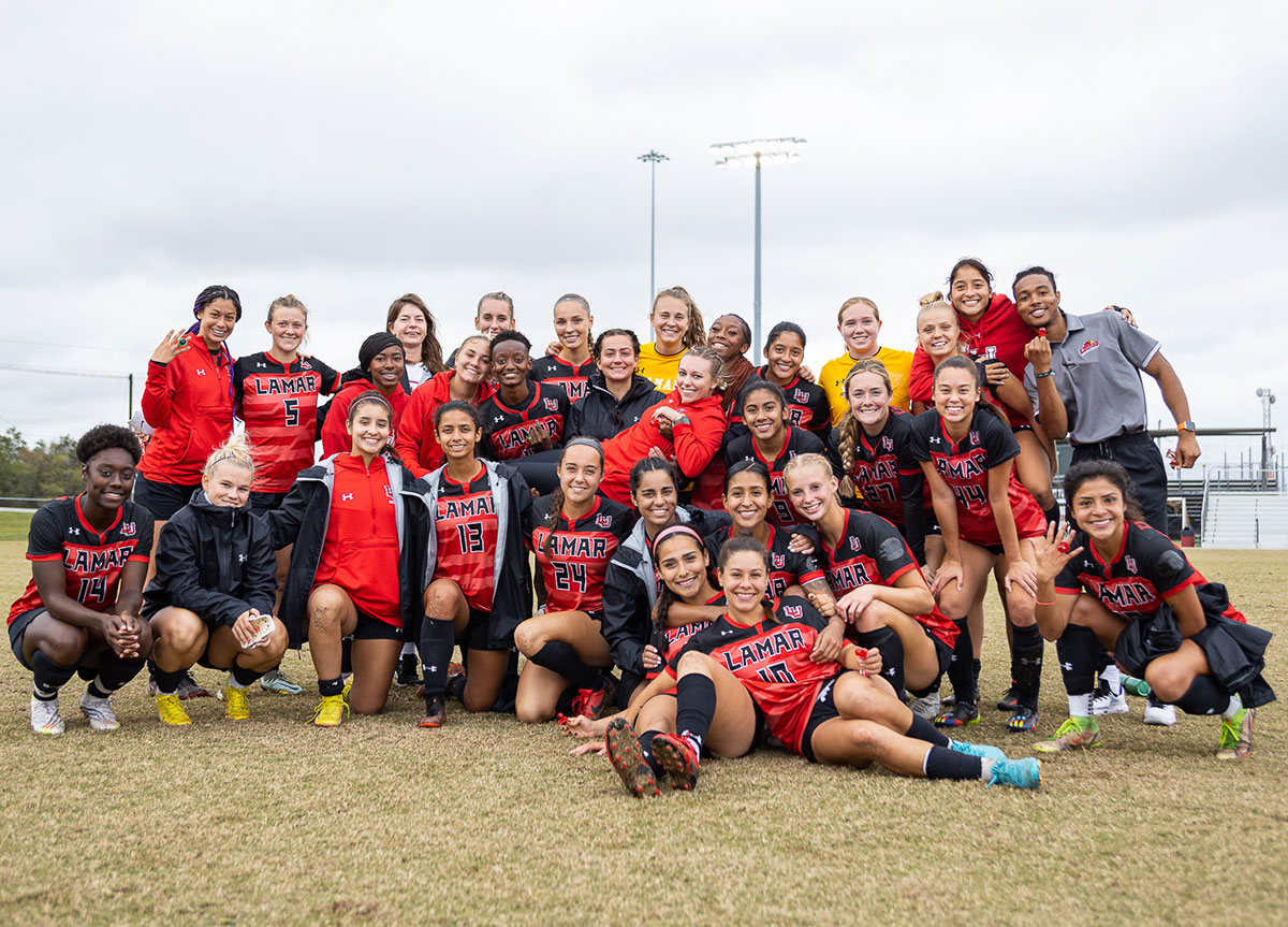 The Lamar Women's Soccer team poses for a group picture after the win on Oct. 28, at the Lamar University Soccer Complex. UP image by Brian Quijada.