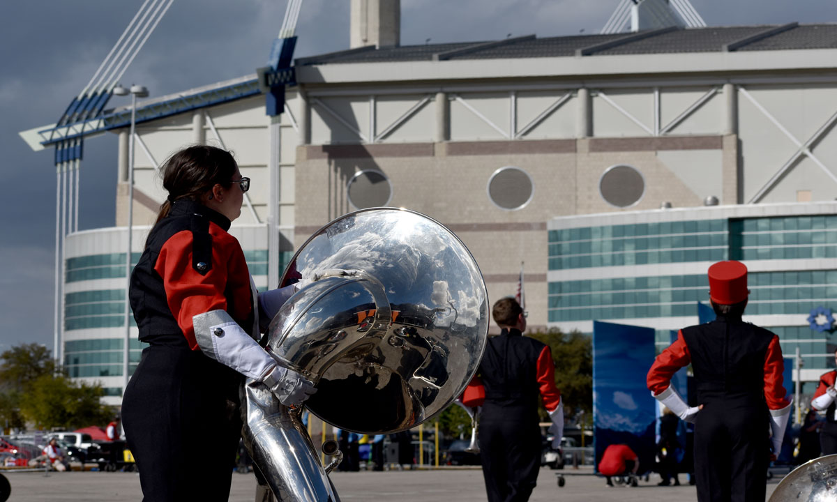 Shortest tuba player stands tall