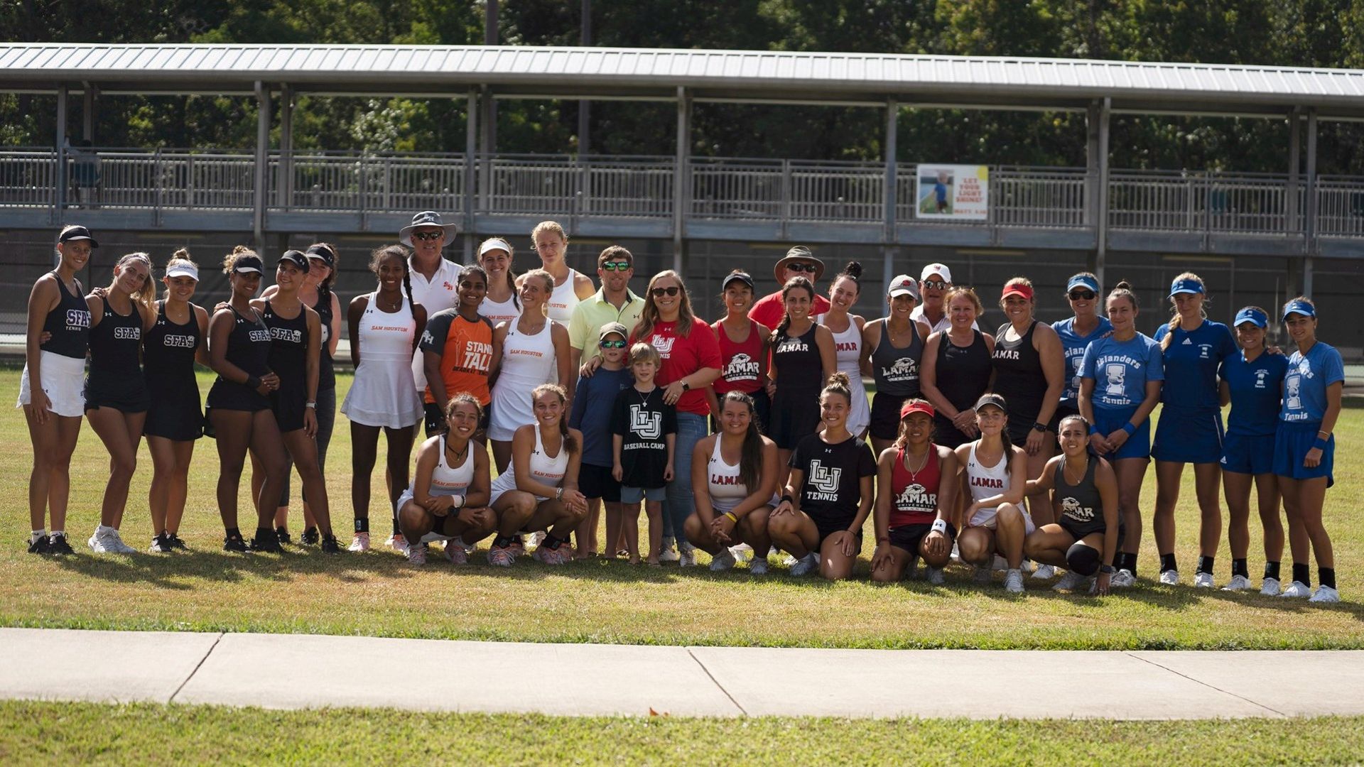 Stephen F. Austin, Sam Houston, Lamar, and Texas A&M-Corpus Christi tennis teams gather for a picture following the tournament. Image credit: LU athletics.