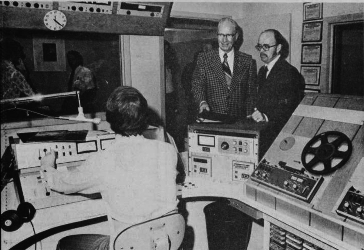 Dr. John Gray, former president of Lamar, and Dr. Brock Brentlinger, dean of the College of Fine and Applied Arts, tour KVLU in 1974. Photographic Services.