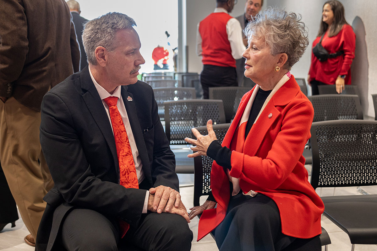 Lamar President Jaime Taylor talks with Carolyn J. Keating after the press conference, Dec. 6, at the Welcome Center. UP photo by Brian Quijada.