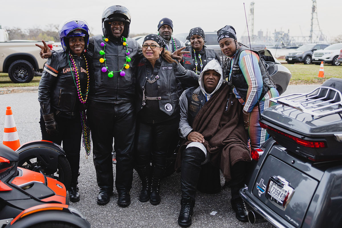 A group of bikers pose for a group image at the Mardi Gras of Southeast Texas, Feb. 18. UP photo by Brian Quijada.