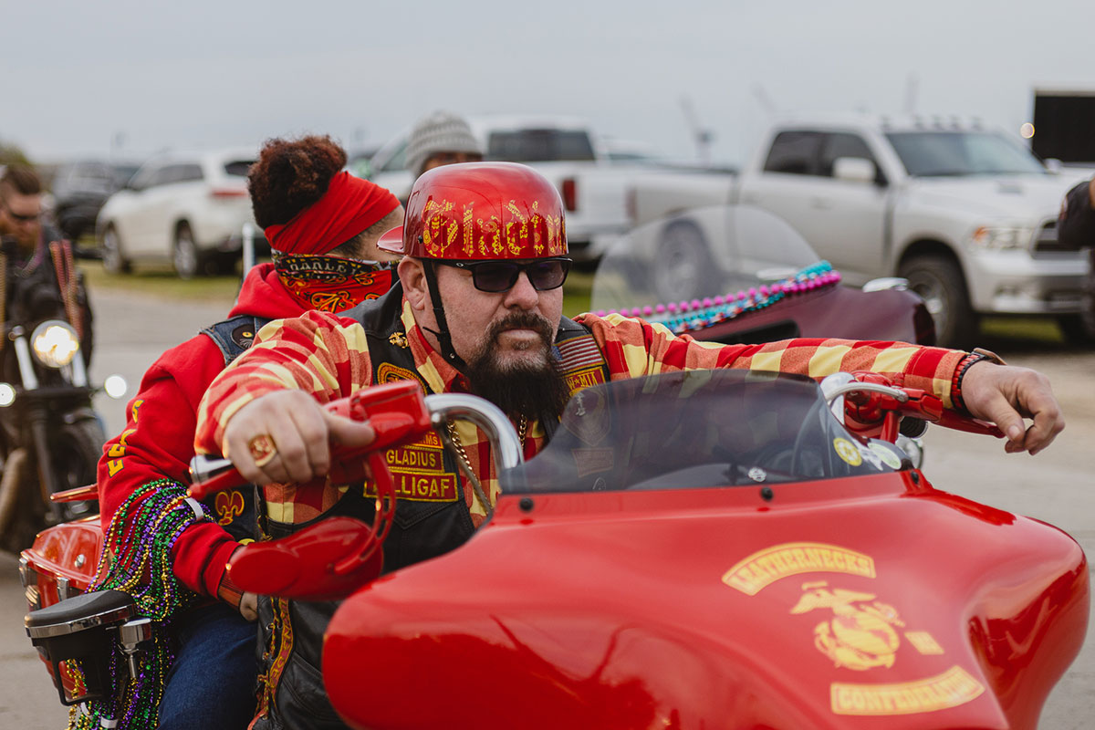 Leathernecks Confederation member Jonny looks off before driving his 2010 Harley Davidson Street Glide at the Mardi Gras of Southeast Texas, Feb. 18. UP photo by Brian Quijada.