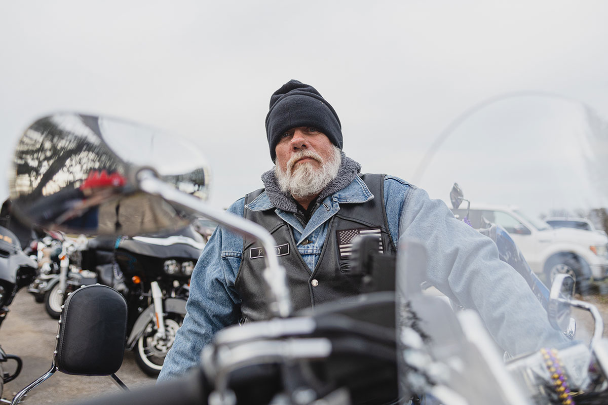 Puppy poses for an image with his Kawasaki Vulcan 900 Classic LT at the Mardi Gras of Southeast Texas, Feb. 18. UP photo by Brian Quijada.