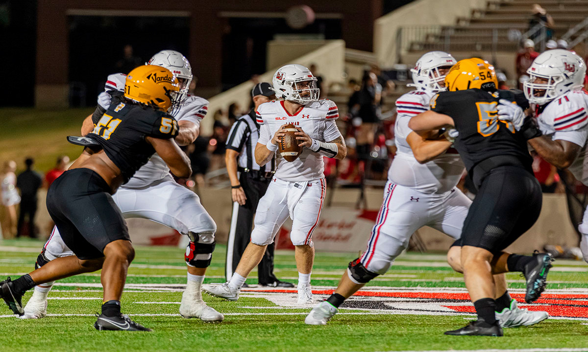 Lamar quarterback Robert Coleman drops back to pass, Aug. 31, at Provost Umphrey Stadium. UP photo by Brian Quijada