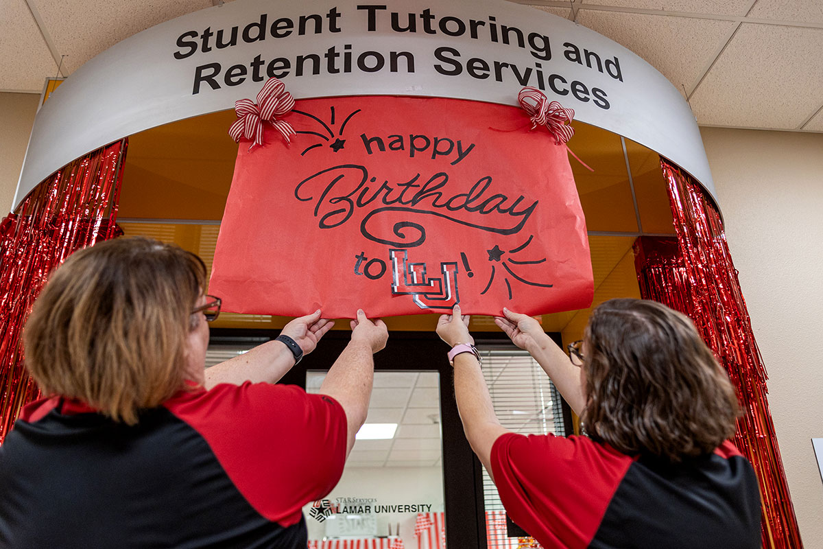 STARS staff decorate their office in the COMM Building. UP photo by Brian Quijada.