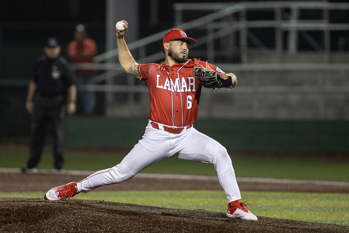 Cardinal pitcher Daniel Cole closes out the game against Kansas State University Feb. 22, at Vincent Beck stadium. UP photo by Brian Quijada.