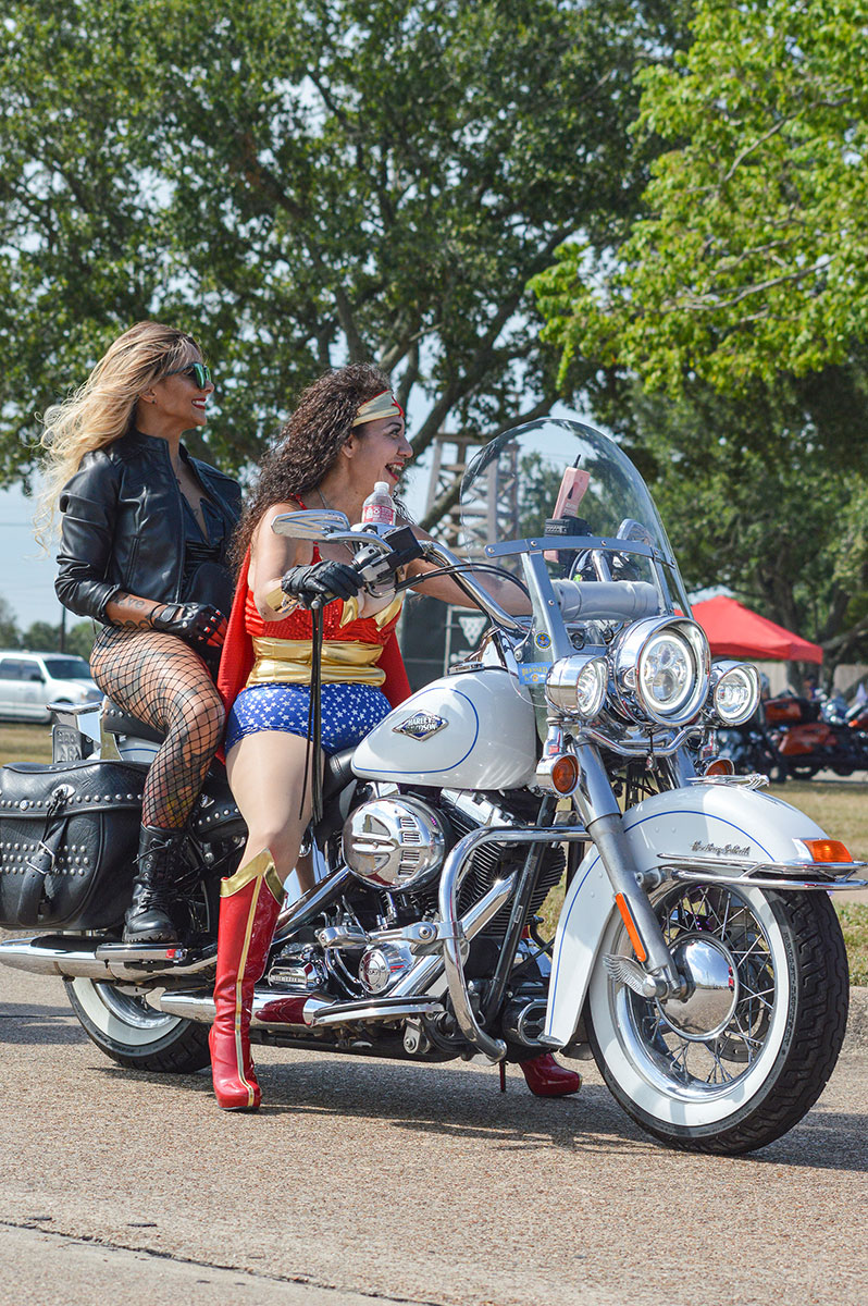 A lady biker is dressed as Wonder Woman for the Ladies in Leather parade & rally, at Spindletop Gladys-City Boomtown Museum in Beaumont, Texas, Sep. 9. UP photo by Isabella Gonzalez.