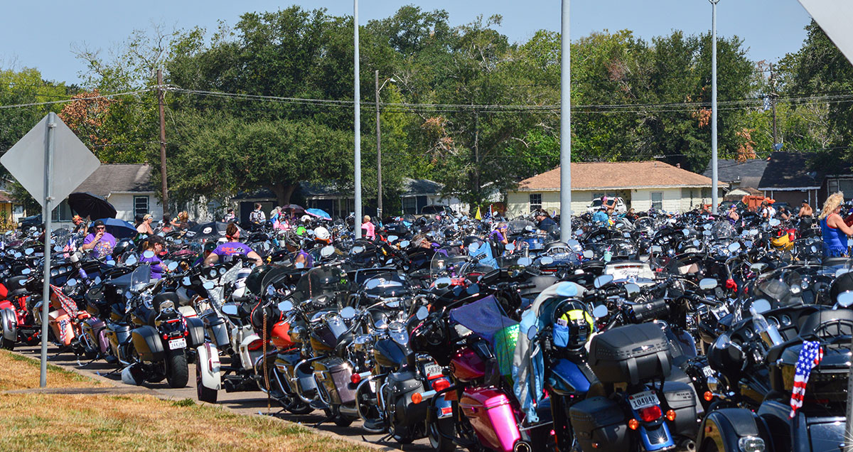 Many motorcycles can be seen parked at the Ladies in Leather parade & rally, at Spindletop Gladys-City Boomtown Museum in Beaumont, Texas, Sep. 9. UP photo by Isabella Gonzalez.