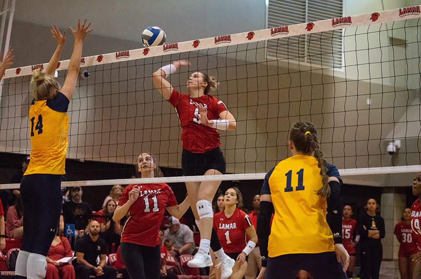 LU middle blocker Wiktoria Warpechowska spikes the ball against the TAMUCC Lions, Sept. 23, at McDonald’s Gym. UP photo by Allyson Arnold.